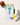 White and teal Team Islam basketball jersey with a ball and sneakers in bright daylight — Basketball